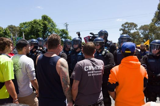 MELTON, VICTORIA/AUSTRALIA - NOVEMBER 2015: Anti Racism protesters violently clashed with reclaim australia groups rallying agsint Mulsim immigration.