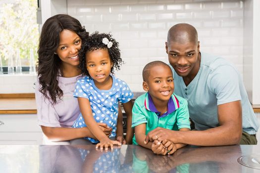 Happy family in the kitchen at home