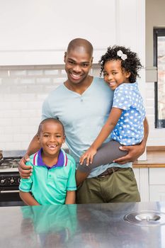 Father and kids in the kitchen together