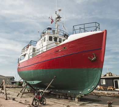 Repair of old wooden fishing ship. 