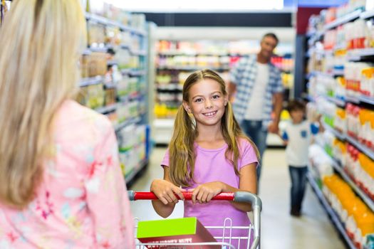 Family shopping together in the supermarket