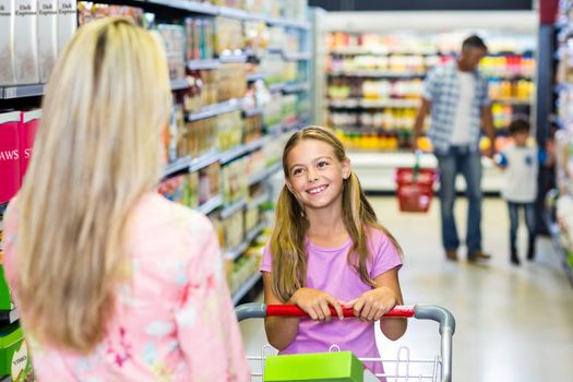 Family shopping together in the supermarket