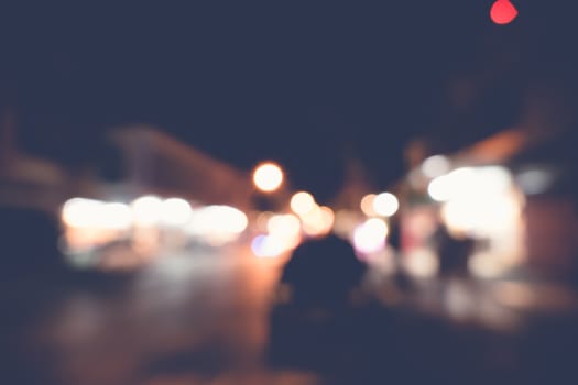 blurred city lights in the night, bokeh background, abstract background