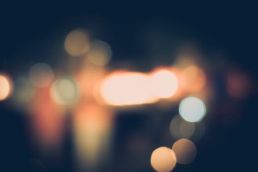 blurred city lights in the night, bokeh background, abstract background