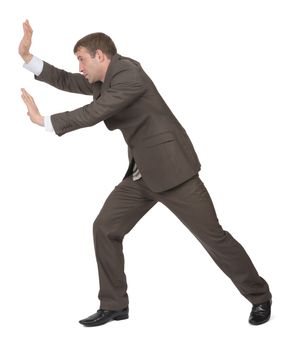 Businessman pushing empty space on isolated white background