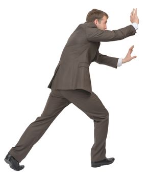 Businessman pushing empty space on isolated white background