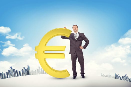 Businessman leaning on euro sign on cityscape background