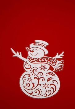 Sticker ,Christmas decoration.White snowman on a red background.Vertical view.