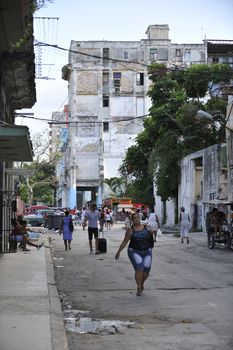 Havana, Cuba, August 2013.  Center of the city looks great in some parts: buildings renewed and streets are clean. Though in the neighborhood the houses are obsolete and dirty.