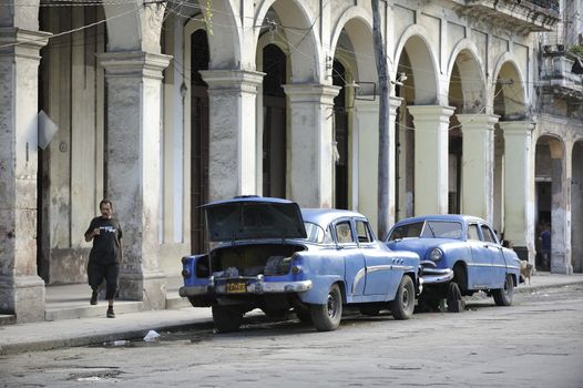 Havana, Cuba, August 2013.  Center of the city looks great in some parts: buildings renewed and streets are clean. Though in the neighborhood the houses are obsolete and dirty.