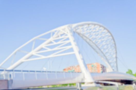 Defocuses background of Garbatella Bridge in Ostiense district, Rome, Italy. Intentionally blurred post production for bokeh effect