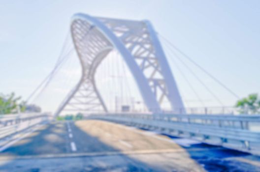 Defocuses background of Garbatella Bridge in Ostiense district, Rome, Italy. Intentionally blurred post production for bokeh effect