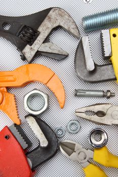 Hand tools  wrenches, pliers, nuts close up