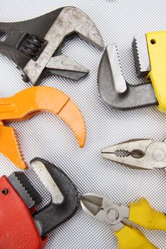 Hand tools,  different  wrenches, pliers,  close up