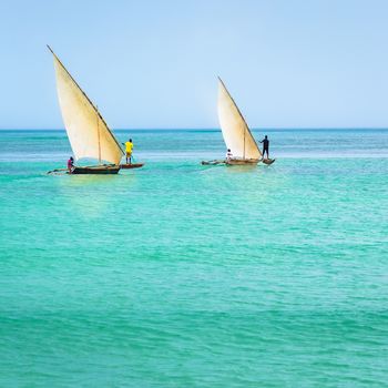 In the picture two traditional catamarans(Ngalawa) on amazing turquoise water in the Indian ocean.