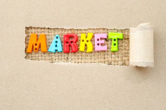 Alphabet color market on brown paper background