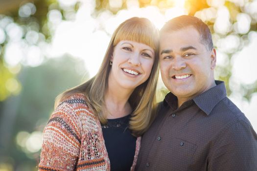 Young Loving Mixed Race Couple Portrait Outdoors.