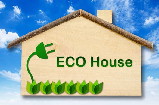 Eco house on Little home wooden model on blue sky background. Save clipping path