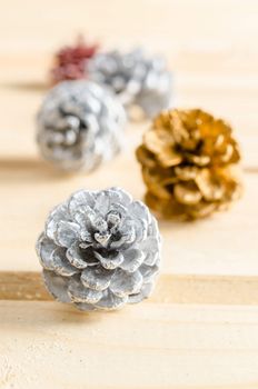 Close up christmas, decoration with pine cones silver.