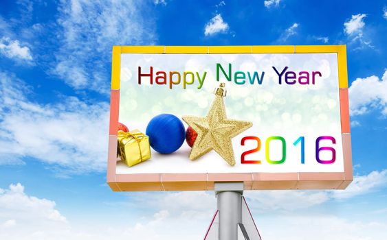 Happy new year 2016 on big billboard with blue sky.