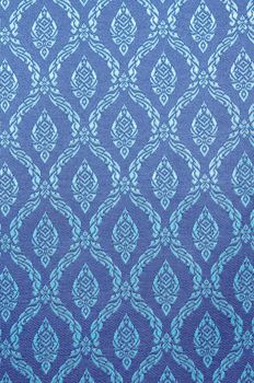 Thai art blue wall pattern for background.