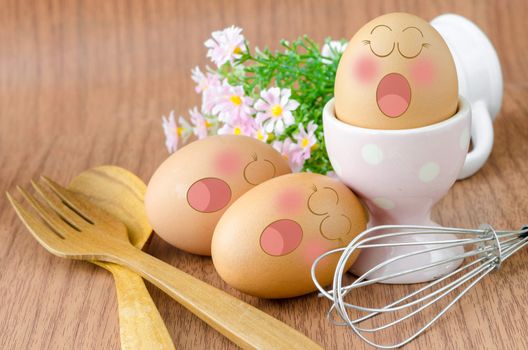 Eggs sleep with Expression Face in white cup and flower on sack background.