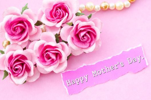 Mather's day card and Beautiful pink roses on pink background.