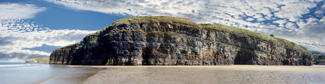 a panorama of the cliffs and beach on the wild atlantic way in ballybunion county kerry ireland