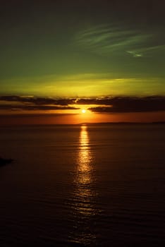 beautiful dark yellow sunset on the wild atlantic way in ireland