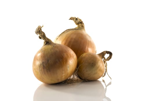 three onion isolated on white background