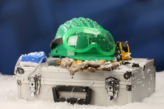 Safety New Year- protective equipment on artificial snow