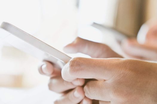 close up of Woman hand holding a Smart Phone background