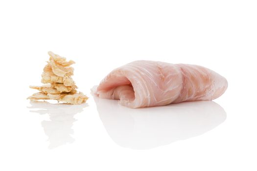 Fresh catfish fillet and dry fish chips isolated on white background. Culinary healthy seafood eating. 