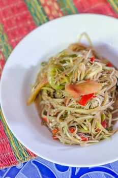 Famous Thai food, spicy papaya salad or "Somtum" in Thai