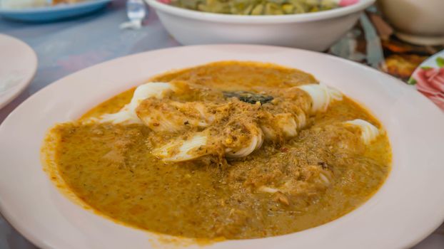 rice noodles with fish curry sauce , asian food