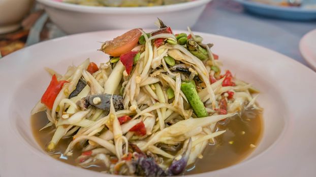 spicy papaya salad with crab, som tum poo