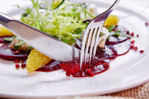 salad of roasted red beets and feta cheese with olive oil