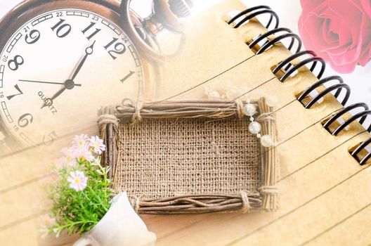 Vintage clock and diary with sack photo frame.Time and memory concept.