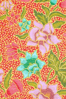 flower pattern background on batik fabric thai style.