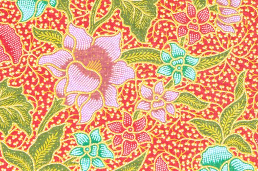 flower pattern background on batik fabric thai style.