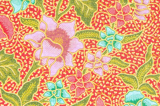 flower pattern background on batik fabric thai style.