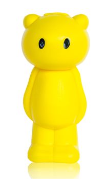 Yellow bear save money box isolated on white background.