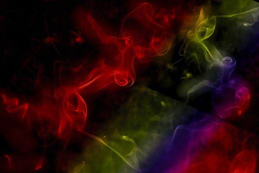 Colorful incense smoke, abstract shape on black background