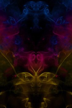 Colorful incense smoke, abstract shape on black background