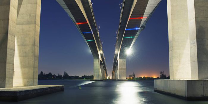 The Gateway Bridge (Sir Leo Hielscher Bridges) at sunset in Brisbane, Queensland, Australia.