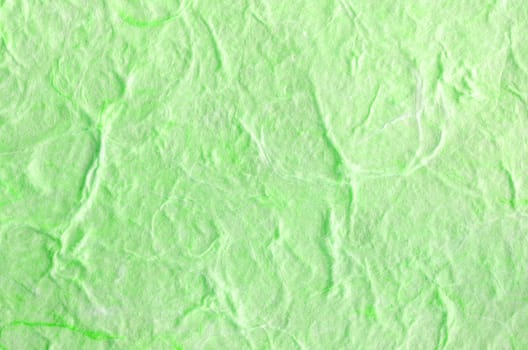 Green paper background with fiber structure. Recycle paper.