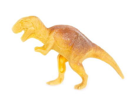 Tyrannosaurus dinosaur plastic figure toy model on white background.