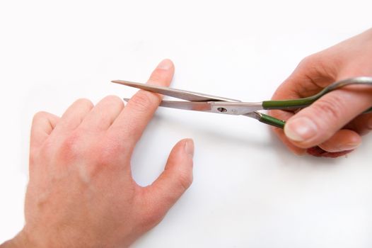 Contraception conceptual image. Contraception symbolic concept with scissors cut-off finger.