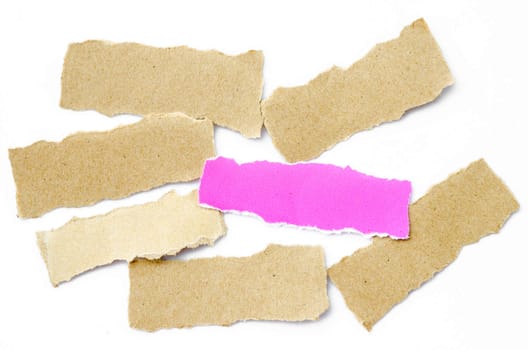 piece of sheet blank pink and brown paper on a white background