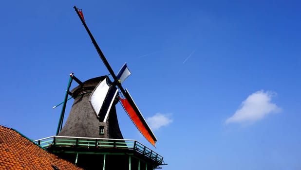 Windmills and blue sky background in holland